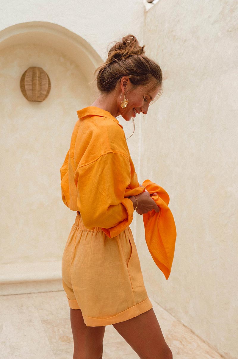 Loose-fitted shorts with pockets - soft orange summer staple